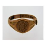 A 9ct gold signet ring with monogram, shank cut, a
