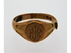 A 9ct gold signet ring with monogram, shank cut, a