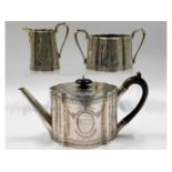 A three piece 19thC. silver tea service by Walter