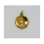 A 9ct gold St. Christopher pendant, 12mm diameter,