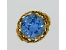 A yellow metal Romany style ring set with topaz, e