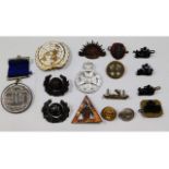 A quantity of mixed badges & pins including Austra