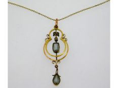 A 9ct gold Edwardian pendant with necklace set wit