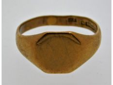 A 9ct gold signet ring, slightly misshapen, size V