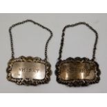 A pair of 1970's silver whisky & sherry labels, 28