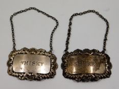 A pair of 1970's silver whisky & sherry labels, 28