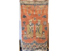 An 18thC. Sino-Tibetan woollen temple pillar rug depicting figures with conch shells, the ancient lu