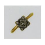 An early 20thC. 18ct gold ring with five small pla