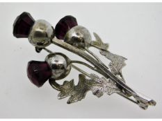 A silver brooch depicting Scottish thistle, 57.25m