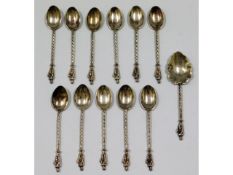 A collection of white metal spoons, test as silver