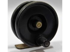 A vintage bakelite fishing reel, 57mm diameter