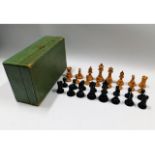 A vintage boxwood chess set with later box, king 3