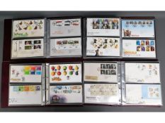 Four first day cover albums, approx. 75 pages, app
