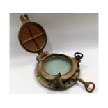 An early 20thC. bronze ships porthole, 14.5in diam