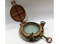 An early 20thC. bronze ships porthole, 14.5in diam