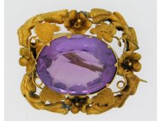 A yellow metal antique brooch, electronically test