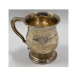 A silver christening mug by Kemp Bros. London, ins