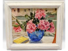 A c.1920's oil still life depicting flower in vase