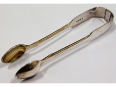 A pair of c.1860 London silver sugar tongs by Jose