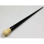 A gentleman's 19thC. ivory topped ebonised cane, 3