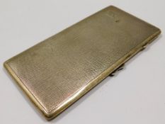 A 1937 machined Birmingham silver cigarette case b