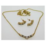 A 14ct gold opal & diamond necklace & earring set,