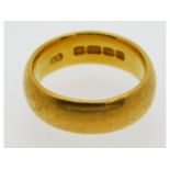 A 22ct gold band, size M/N, 11.4g