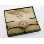 A ladies 9ct gold cased wrist watch with gold inte