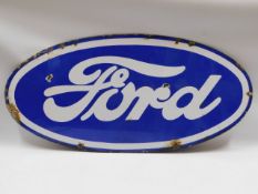 A large vintage Ford motor car company enamel sign
