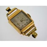 A ladies early 20thC. 18ct gold case wristwatch, 1