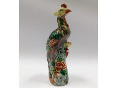 A 19thC. Chinese polychrome phoenix, 8.25in tall