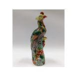 A 19thC. Chinese polychrome phoenix, 8.25in tall