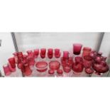 A collection of mostly Victorian cranberry glass i