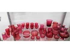 A collection of mostly Victorian cranberry glass i