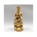 An 18thC. carved & gilded ivory Sino-Tibetan figur