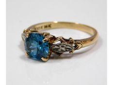 A 14ct gold ring set with zircon & 10ct mounted di