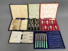 Five cased vintage cutlery sets