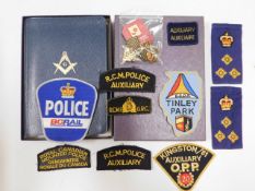 A Masonic bible tinned with various police related