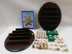 A quantity of thimbles & two display shelves inclu