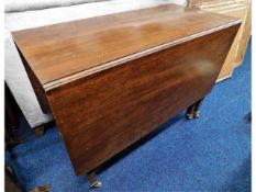 A good George III mahogany drop leaf table with br