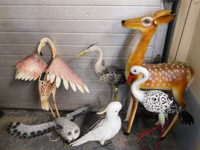 A quantity of decorative metal garden ornaments, d