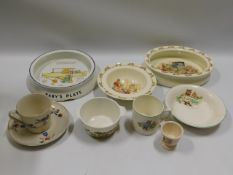 Eight pieces of nursery ware including Doulton Bun