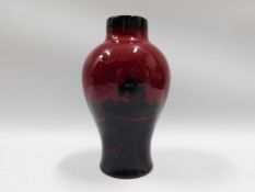 A Royal Doulton flambe vase of baluster form 6.25i