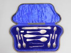 A cased eleven piece silver plated breakfast set