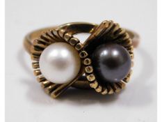 A 9ct gold ring set with pearl, size N. 3.8g