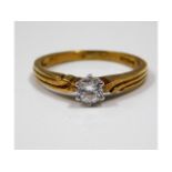 A 9ct gold ring set with 0.25ct diamonds, size P/Q