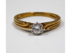 A 9ct gold ring set with 0.25ct diamonds, size P/Q