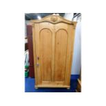 An antique pine wardrobe, 74in high x 18.5in x 39i