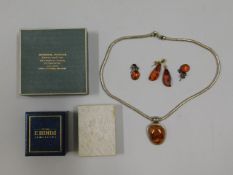 A silver & amber necklace, a pair of silver mounte