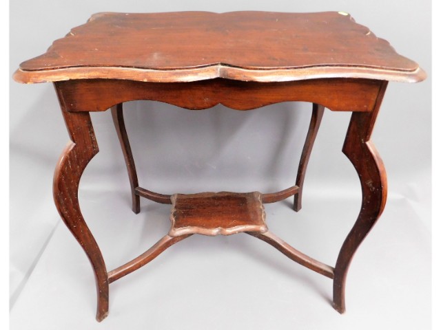 A decorative c.1900 oak occasional table, 29.25in